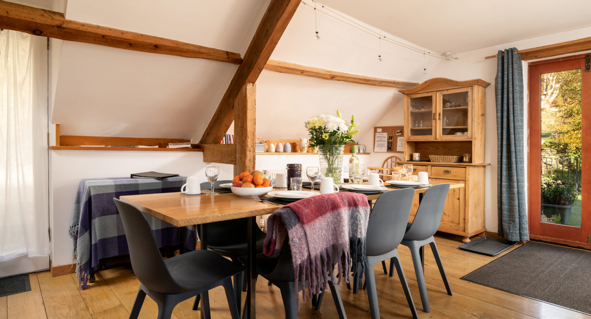 Dining table with seating for 6 inside the large group self catering accommodation