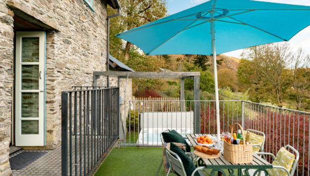 Outdoor seating by the Granary, our large group self catering accommodation holiday lodge
