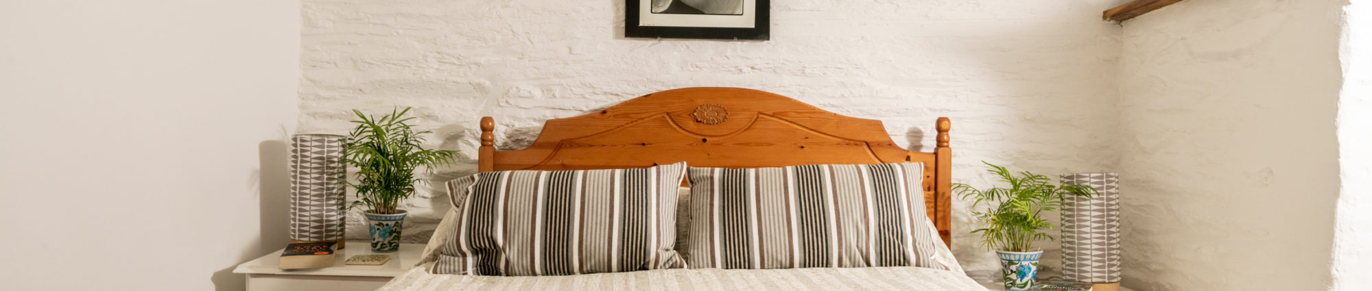 One of the double beds in an Elan Valley cottage