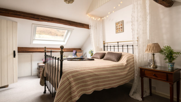 Bedroom of the cosy cottage for couples accommodation near Builth Wells